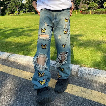 Butterfly Embroidered Torn Jeans For Men